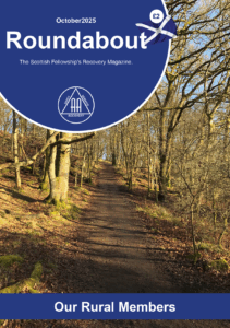 Road through Autumnal trees Roundabout cover October 2025